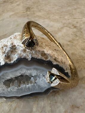 MELINDA MARIA Gold-Tone Hinged Cuff Bracelet with Black Stone and Cubic Accents
